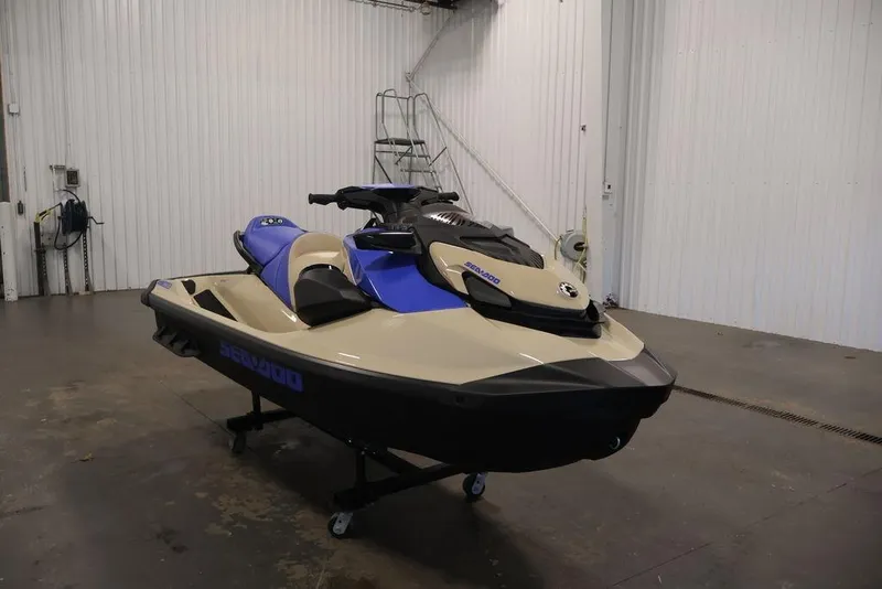 Slide: The Image of 2026 Sea-Doo Wake 170 jet ski in a garage, featuring a sleek design and blue accents. - 6
