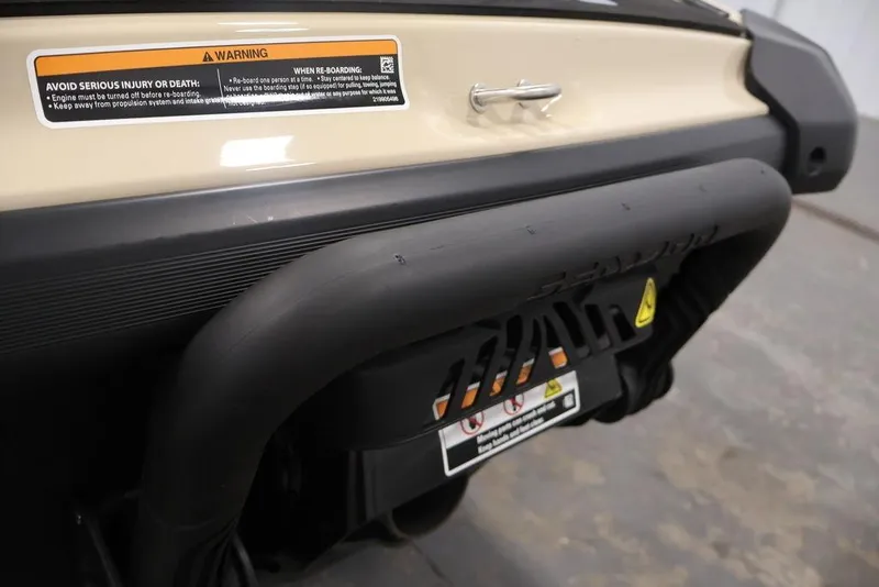 Slide: The Image of 2026 Sea-Doo Wake 170 rear view with safety warning label. - 22