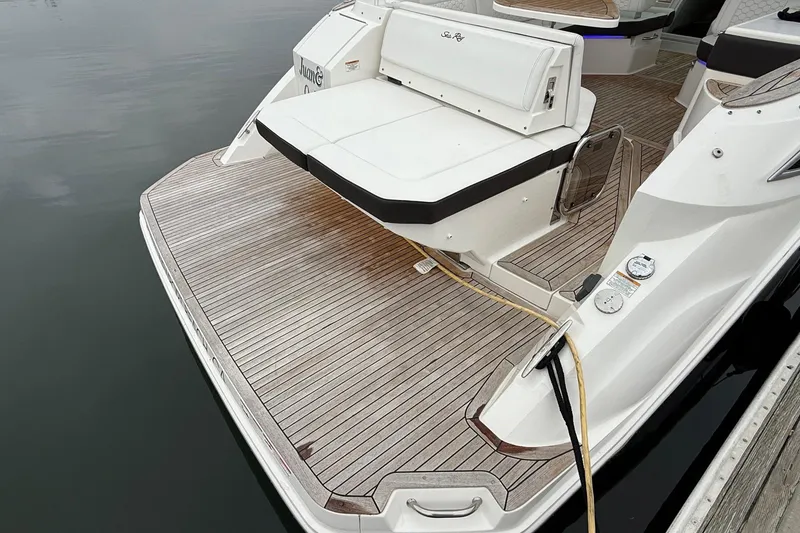 Slide: The Image of 2023 Sea Ray Sundancer 320 Coupe with custom "Juan & Only" name on deck. - 20
