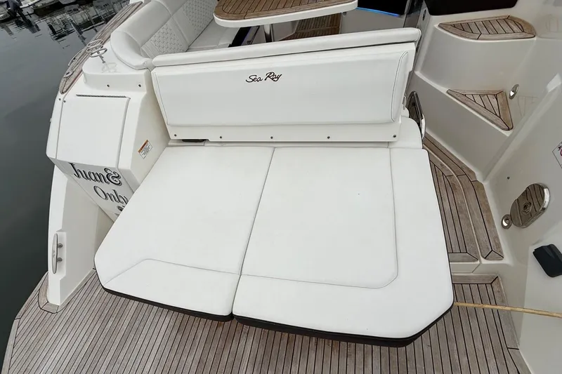 Slide: The Image of Control panel of 2023 Sea Ray Sundancer 320 Coupe with switches and power connections. - 24