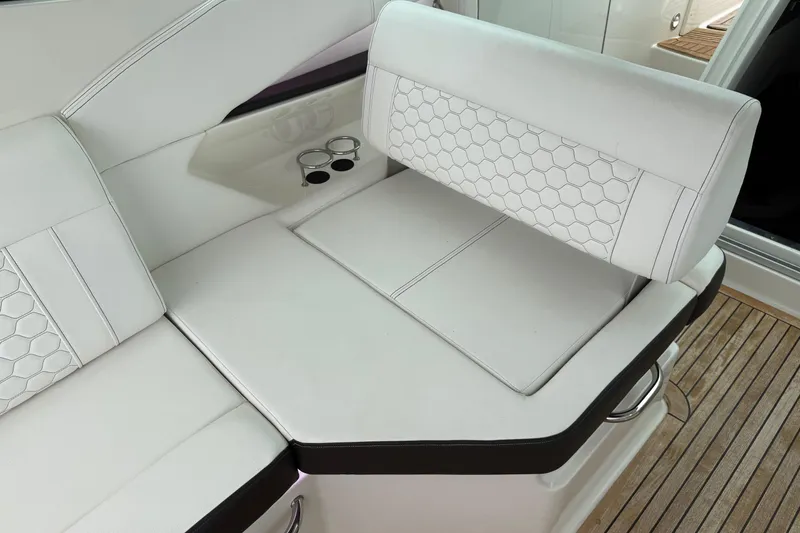 Slide: The Image of 2023 Sea Ray Sundancer 320 Coupe sunroof interior with sleek design and integrated speakers. - 33