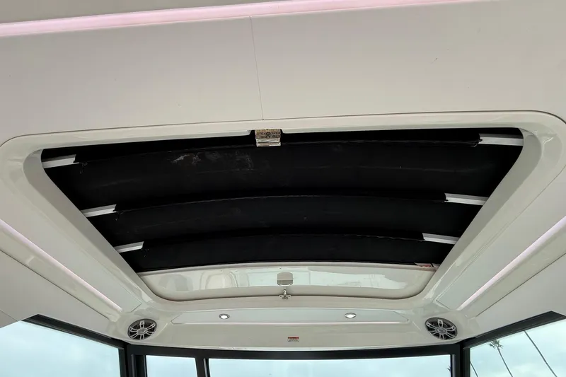 Slide: The Image of 2023 Sea Ray Sundancer 320 Coupe interior with luxurious seating and modern design. - 37