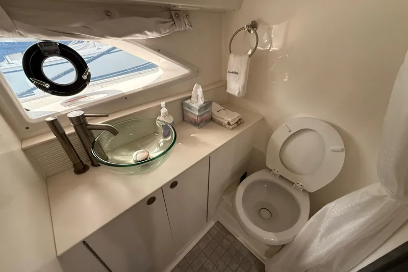 Slide: The Image of Joystick control on 2023 Sea Ray Sundancer 320 Coupe boat dashboard. - 48