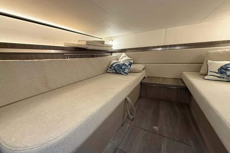 Slide: The Image of 2023 Sea Ray Sundancer 320 Coupe bathroom with modern sink and toilet. - 56