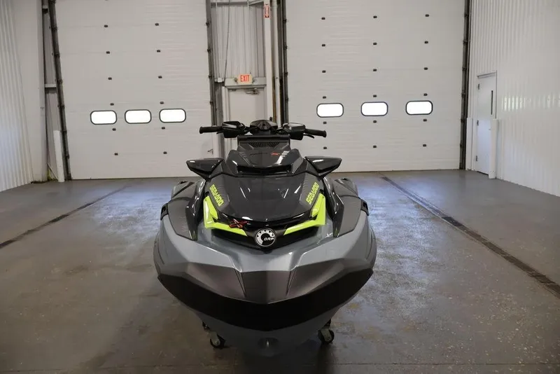 Slide: The Image of 2026 Sea-Doo RXT-X 325 jet ski in a garage, front view. - 10
