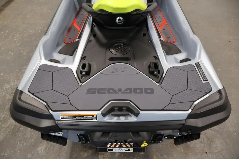 Slide: The Image of 2026 Sea-Doo RXT-X 325 jet ski rear deck with sleek design and branding. - 18