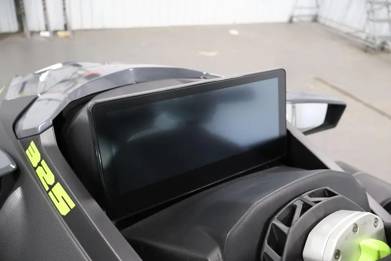Slide: The Image of 2026 Sea-Doo RXT-X 325 dashboard with digital display and sleek design. - 7