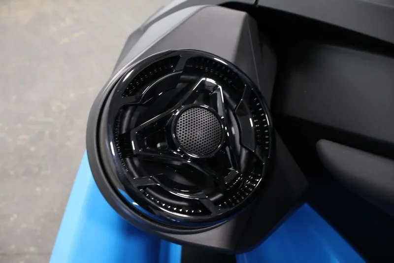 Slide: The Image of Close-up of 2026 Sea-Doo RXT-X 325 speaker detail, showcasing sleek black design. - 13