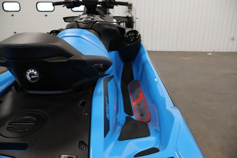 Slide: The Image of 2026 Sea-Doo RXT-X 325 jet ski, blue color, detailed view of seat and controls. - 14
