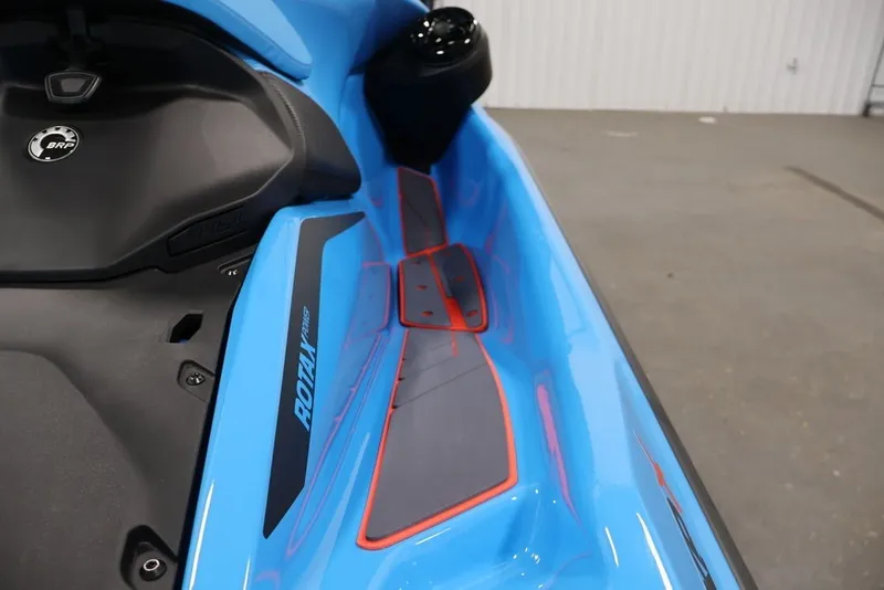 Slide: The Image of 2026 Sea-Doo RXP-X 325 jet ski, blue with red accents, featuring Rotax engine branding. - 13