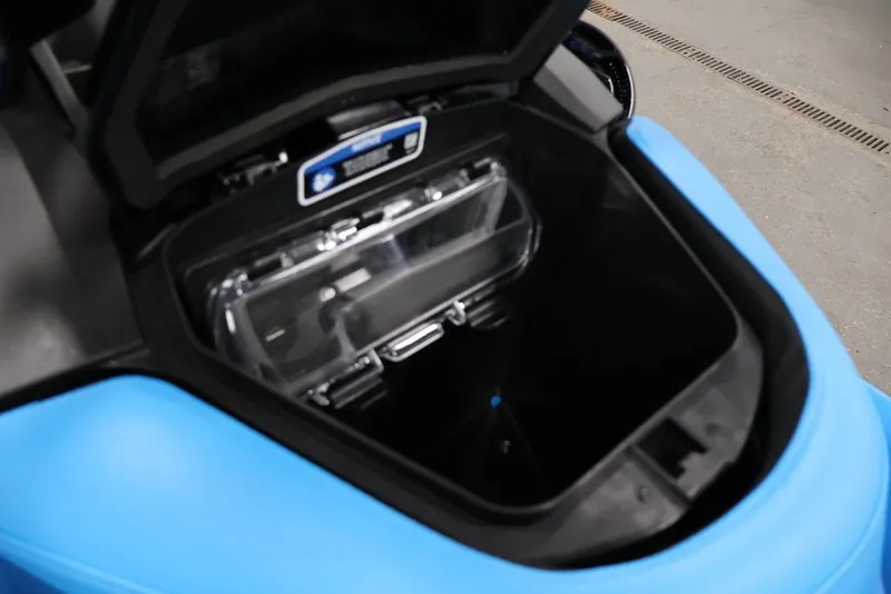 Slide: The Image of Open storage compartment of 2026 Sea-Doo RXP-X 325 watercraft. - 16