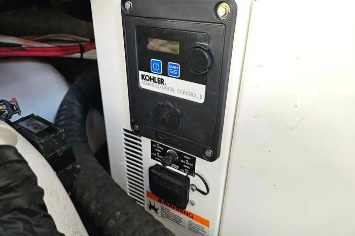 Slide: The Image of Kohler advanced digital control panel on 2014 Four Winns V375 boat. - 24