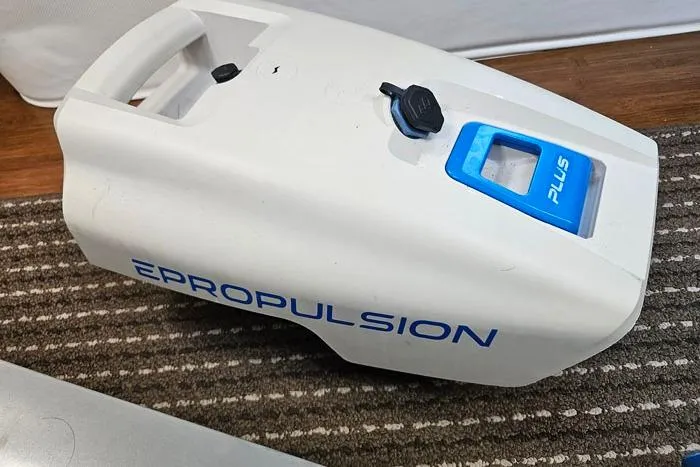 Slide: The Image of White ePropulsion Plus motor on striped carpet, 2014 Four Winns V375 model. - 33