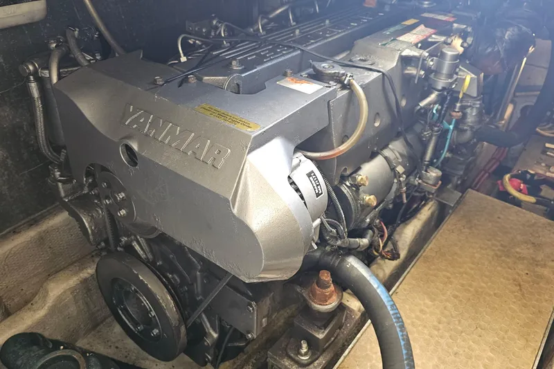Slide: The Image of Engine compartment of a 2004 Luhrs 34 Convertible boat with Yanmar engine. - 45