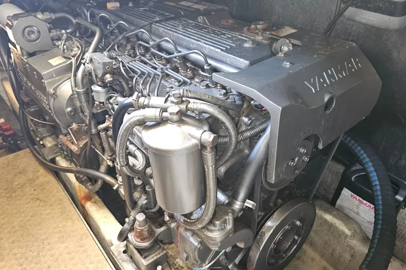 Slide: The Image of Engine of a 2004 Luhrs 34 Convertible boat, featuring Yanmar components. - 46