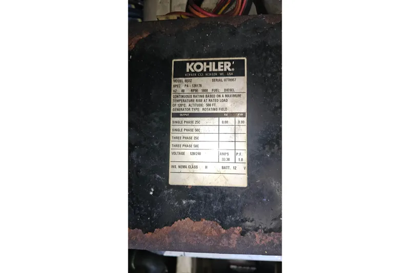 Slide: The Image of Kohler generator label on 2004 Luhrs 34 Convertible, model 8EOZ, diesel fuel specifications. - 48