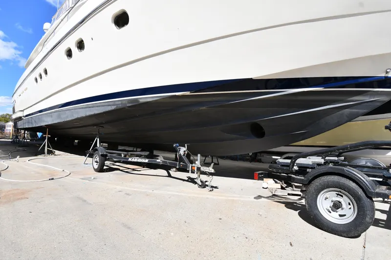 Slide: The Image of 2001 Ferretti Yachts 72 on trailer, showcasing hull design and structure. - 2