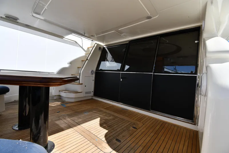 Slide: The Image of Interior of 2001 Ferretti Yachts 72 with wooden flooring and staircase. - 21