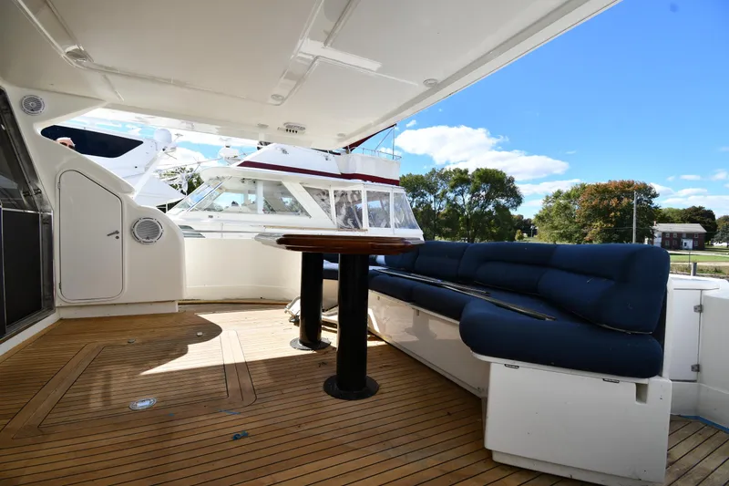 Slide: The Image of Luxurious 2001 Ferretti Yachts 72 with spacious deck and comfortable seating. - 23