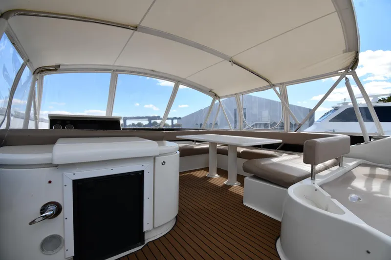 Slide: The Image of 2001 Ferretti Yachts 72 interior with seating and table under canopy. - 28