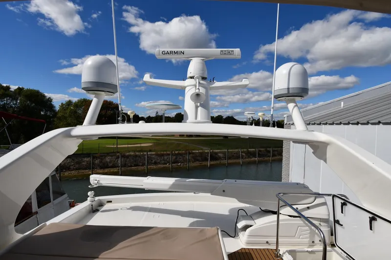 Slide: The Image of Ferretti Yachts 72, 2001 model, featuring radar equipment on a sunny day. - 41