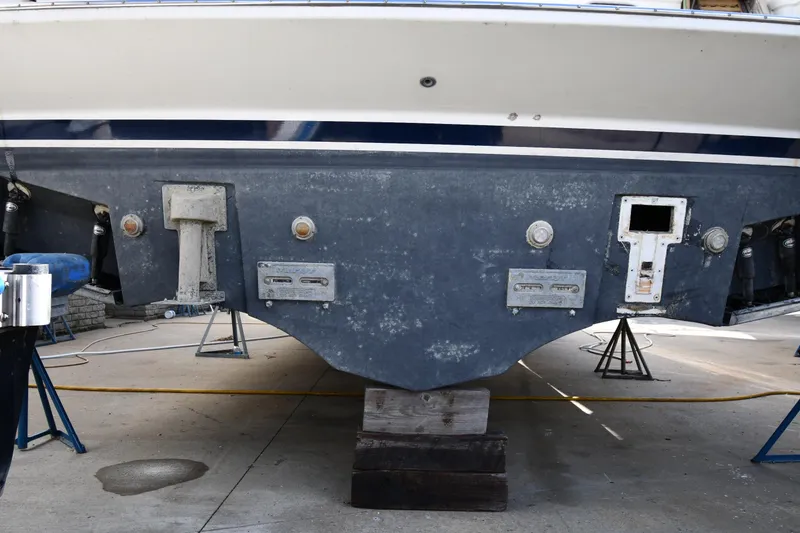 Slide: The Image of 2001 Ferretti Yachts 72 on dry dock, showing hull and stern details. - 6
