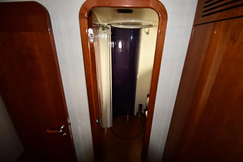 Slide: The Image of Interior view of 2001 Ferretti Yachts 72, featuring a compact shower area. - 66