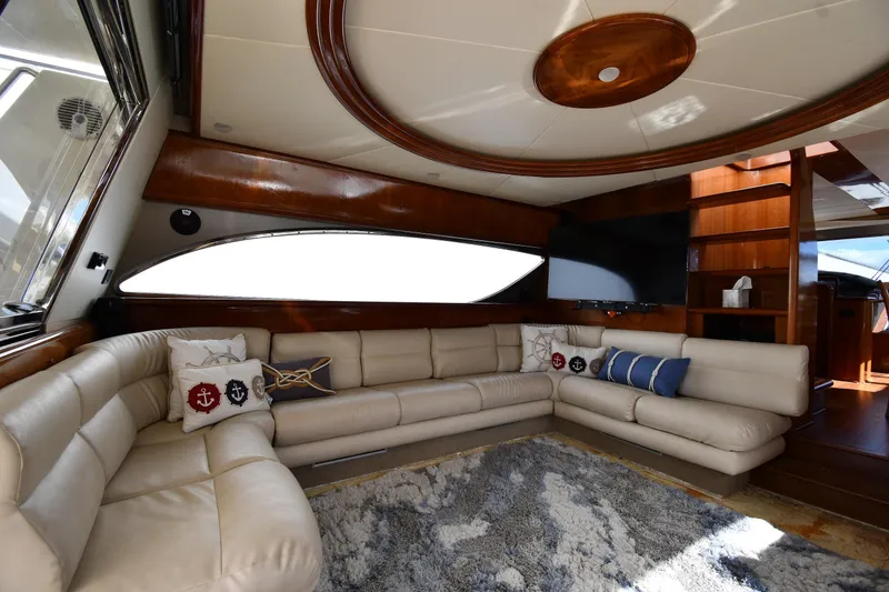 Slide: The Image of Luxurious interior of 2001 Ferretti Yachts 72 with plush seating and nautical decor. - 79