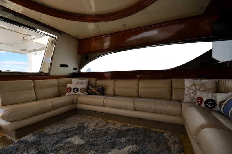 Slide: The Image of Luxurious interior of 2001 Ferretti Yachts 72 with plush seating and nautical decor. - 81