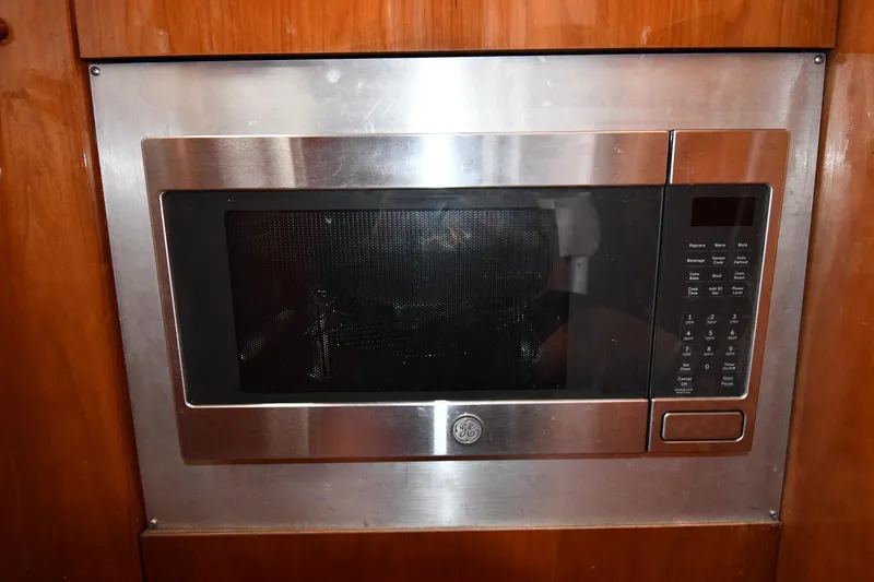 Slide: The Image of Built-in microwave in 2001 Ferretti Yachts 72 kitchen area. - 93