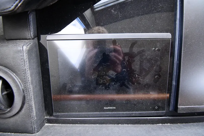 Slide: The Image of Garmin display on 2001 Ferretti Yachts 72 dashboard, featuring sleek design and modern technology. - 102