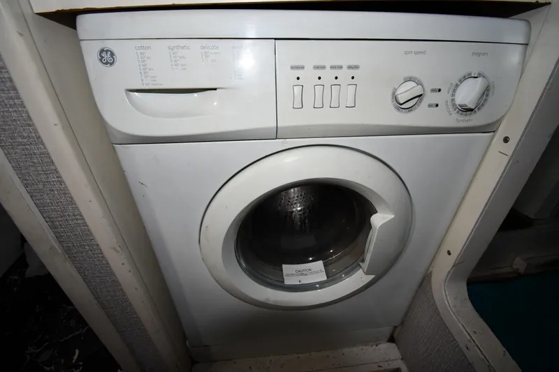 Slide: The Image of GE washing machine inside a 2001 Ferretti Yachts 72. - 115