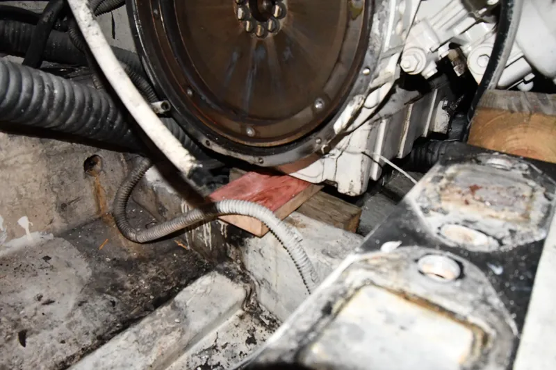 Slide: The Image of Engine compartment of a 2001 Ferretti Yachts 72, showing mechanical components and wiring. - 130