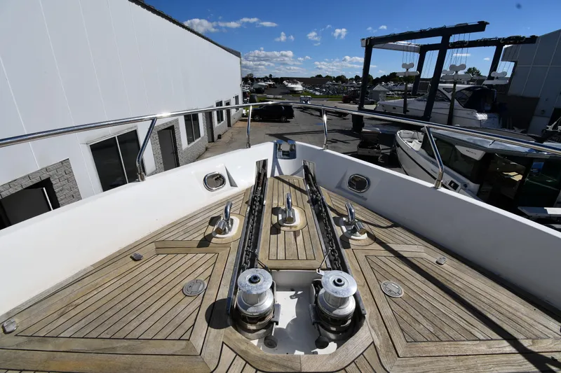 Slide: The Image of Bow view of 2001 Ferretti Yachts 72, showcasing deck and anchor system. - 14