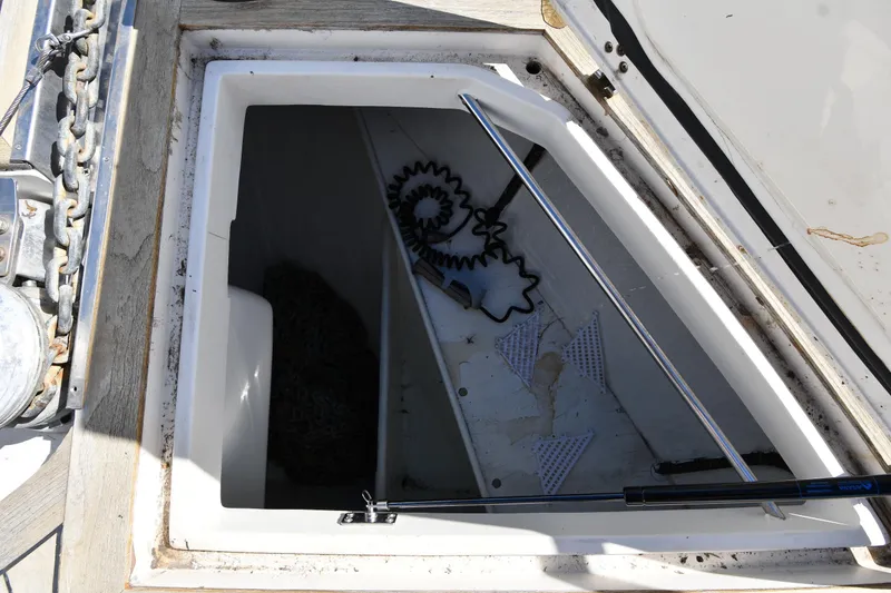 Slide: The Image of Open storage compartment on 2001 Ferretti Yachts 72, showing interior details and equipment. - 17