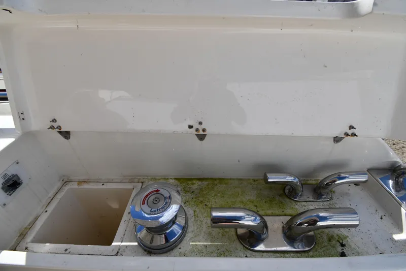 Slide: The Image of 2001 Ferretti Yachts 72 deck equipment with winch and chrome fittings. - 24