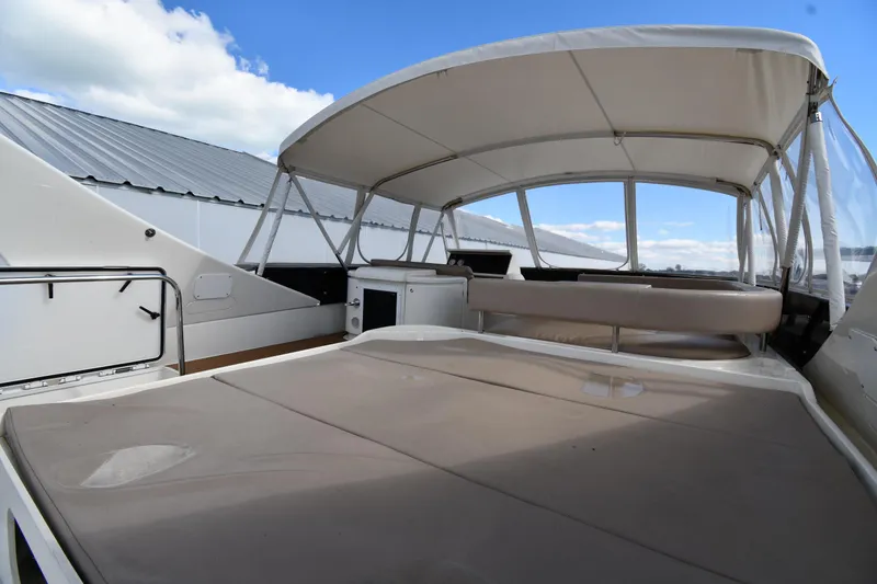 Slide: The Image of Spacious deck of 2001 Ferretti Yachts 72 with canopy and seating area. - 29