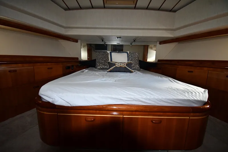 Slide: The Image of Luxurious bedroom interior of 2001 Ferretti Yachts 72 with elegant wood finish. - 45