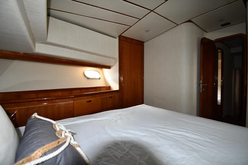 Slide: The Image of Luxurious cabin interior of 2001 Ferretti Yachts 72 with elegant wood finishes. - 49