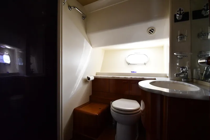 Slide: The Image of Luxurious bathroom in 2001 Ferretti Yachts 72, featuring modern fixtures and natural light. - 54