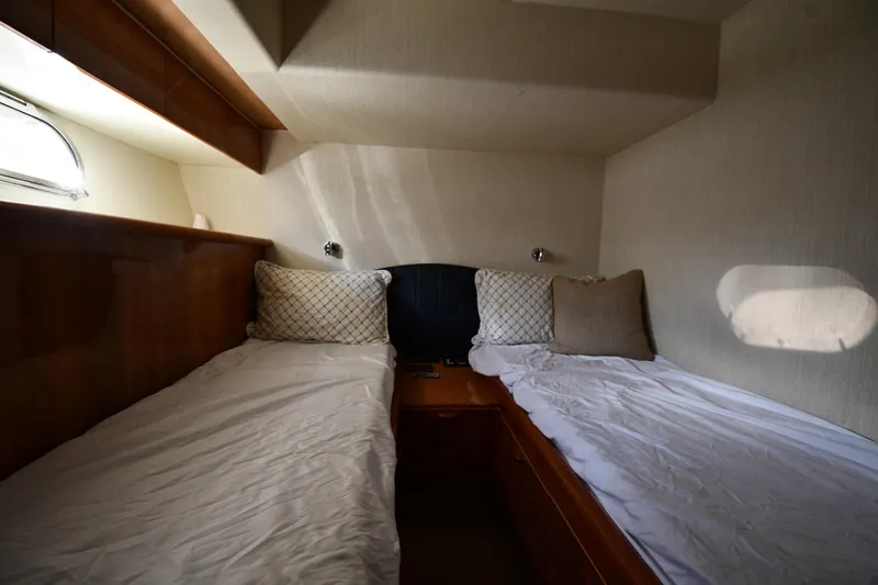 Slide: The Image of Twin cabin interior of 2001 Ferretti Yachts 72, featuring cozy beds and elegant design. - 59