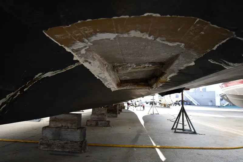 Slide: The Image of Underside view of a 2001 Ferretti Yachts 72, showing hull repair work. - 7