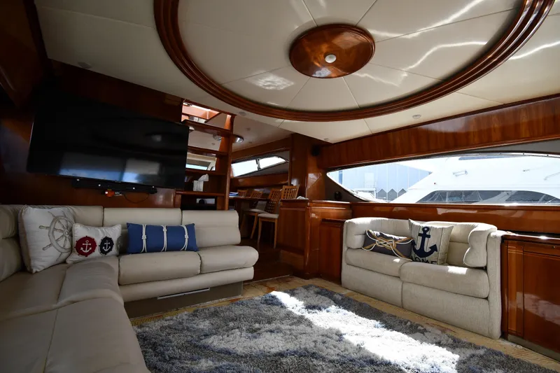 Slide: The Image of Luxurious interior of 2001 Ferretti Yachts 72 with plush seating and nautical decor. - 78