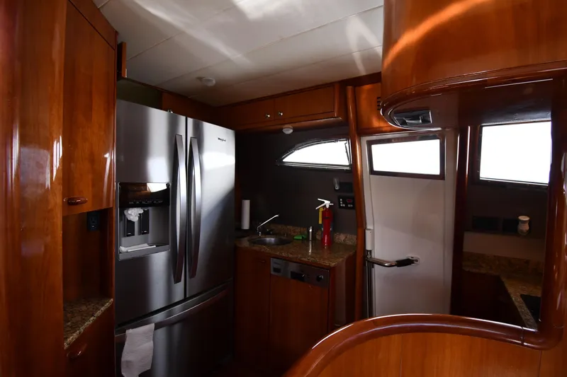 Slide: The Image of Luxurious kitchen interior of 2001 Ferretti Yachts 72 with stainless steel appliances. - 88