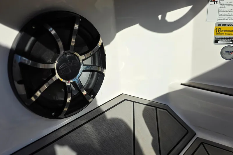 Slide: The Image of 2020 Moomba Makai boat interior with speaker and seating capacity label. - 22