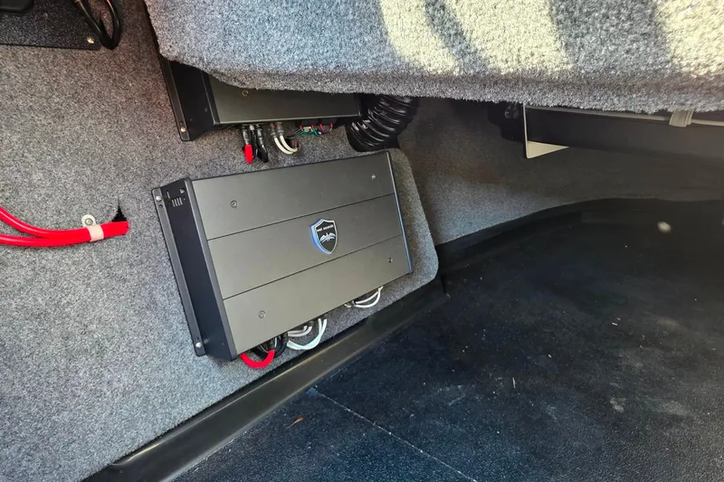 Slide: The Image of 2020 Moomba Makai interior showing audio amplifier installation with wiring. - 23