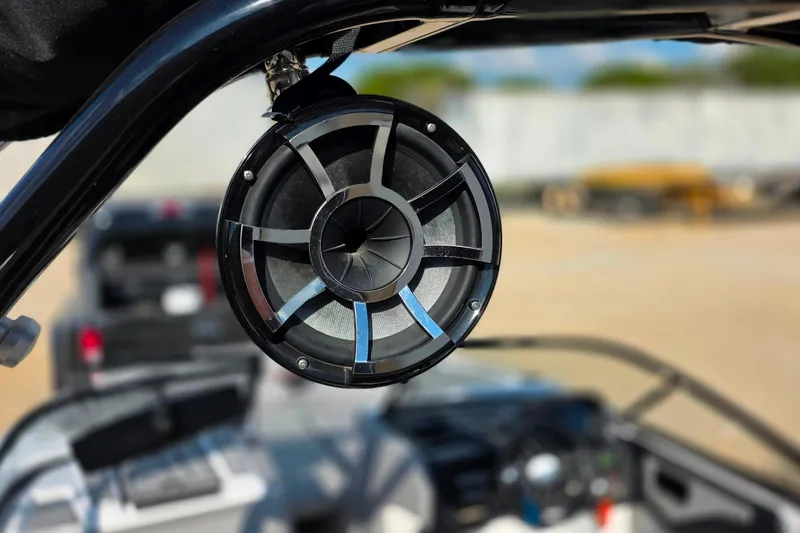 Slide: The Image of Close-up of a speaker on a 2020 Moomba Makai boat, with blurred background. - 26