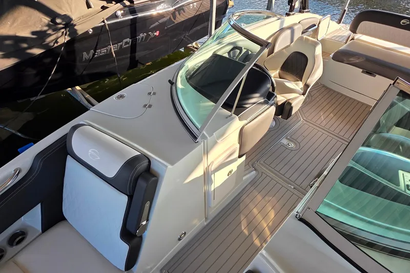 Slide: The Image of 2022 Crownline 255 SS SURF boat interior with seating and deck details. - 24