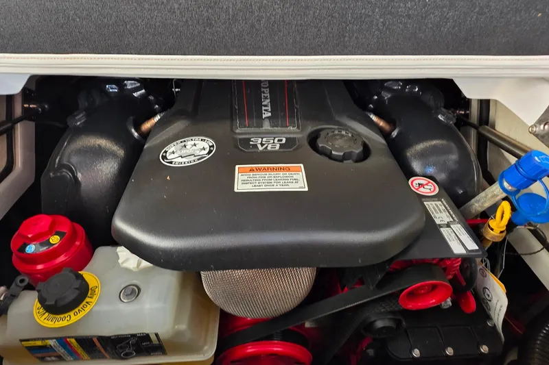 Slide: The Image of 2022 Crownline 255 SS SURF engine, featuring a powerful 350 V8 motor. - 26