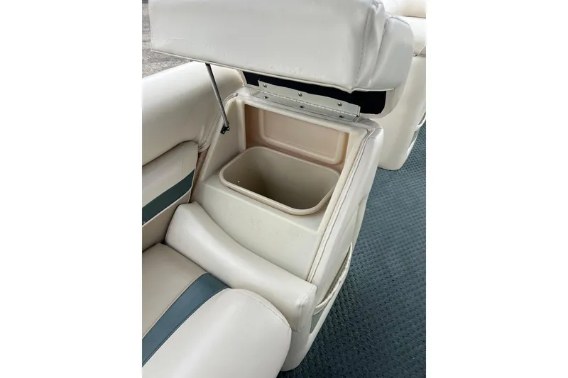 Slide: The Image of 2006 Bennington 2575 FS boat seat with built-in storage compartment. - 35